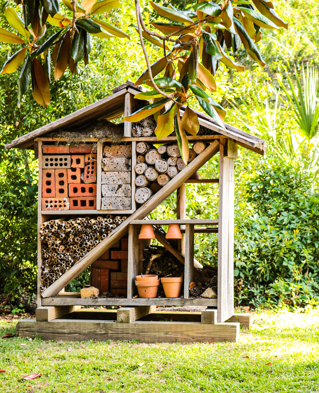 Built using oak salvaged from The Grove property, the "bug hotel" helps museum staff educate the public about the ecological roles of insects in Tallahassee's urban forest. 