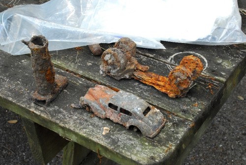 Artifacts found in the cistern at The Grove included several metal toys from the 1940s. Photo by Roy Lett, courtesy of the Florida Bureau of Archaeological Research