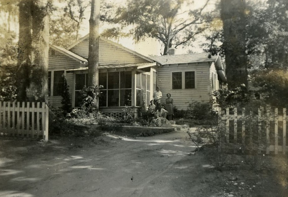 Jensen family at the Burr Cottage (105 E. 3rd Ave.), ca. 1940.