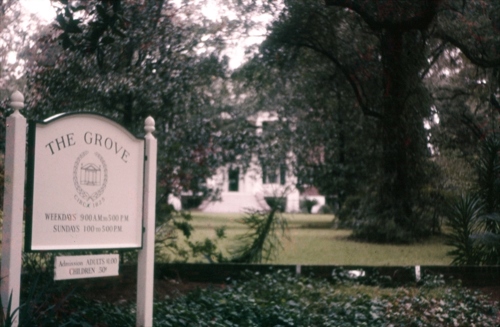 View from Adams Street of the original museum sign for The Grove, ca. 1960.