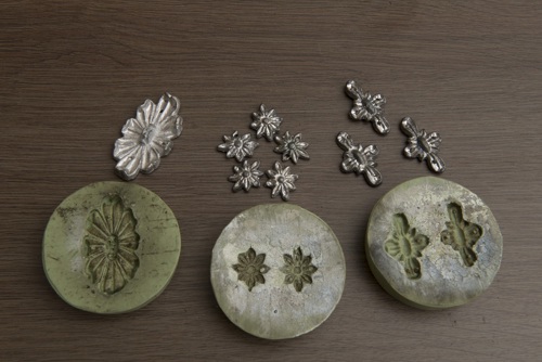 lead ornaments with rubber molds for future reproduction.