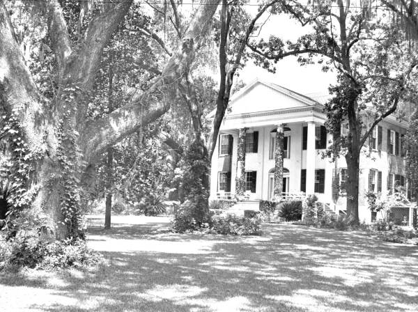 This photograph shows the Call-Collins House around 1950.