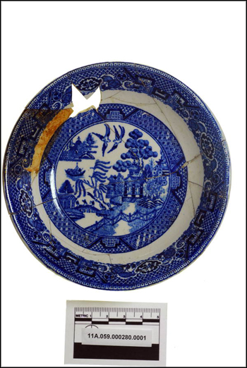 Fragments of blue willow plates.