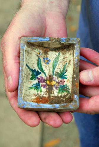 Archaeologists recovered few intact items from the cistern at The Grove. This small decorative dish is an exception and likely dates from the late 1800s or early 1900s. Photo by Roy Lett, courtesy of the Florida Bureau of Archaeological Research